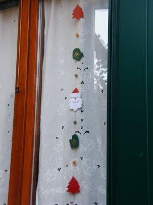 DECORAPORTA E DECORAFINESTRE XMAS in feltro DECORAPORTA E DECORAFINESTRE XMAS in feltro
