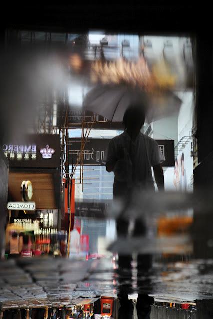 Hong Kong in the Rain by Christophe Jacrot