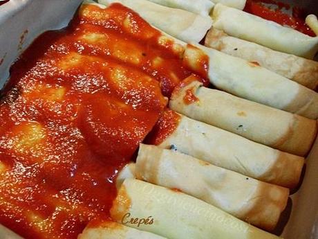 Cannelloni di crespelle con ricotta e spinaci al sugo di salsiccia