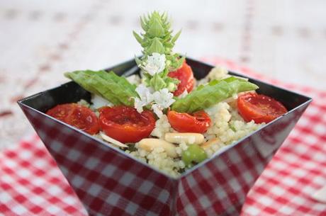 Cous cous con pesto scomposto e pomodorini confit