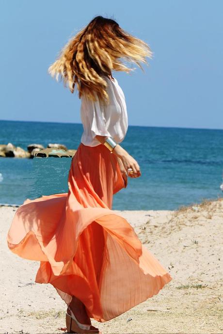 Gipsy skirt in a wild beach