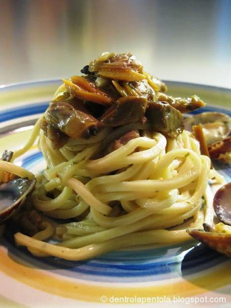 Spaghetti con funghi e vongole