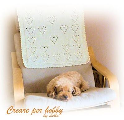 Cuori traforati per una copertina da culla Cuori traforati per una copertina da culla