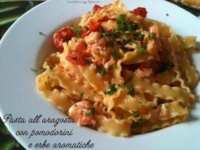 Pasta all'aragosta con pomodorini e erbe aromatiche