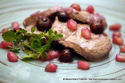 Filetto di maiale saltato in padella con mirtilli e melograno al profumo di Tequila