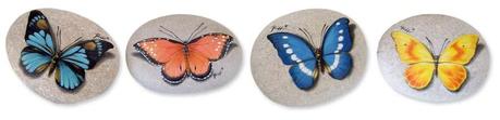 Farfalle dipinte sui sassi