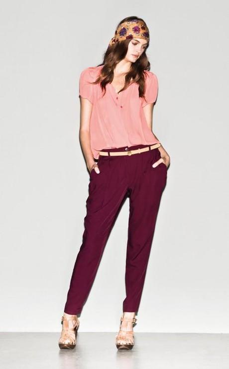 “In this image: Shirt (5CC95Q2Q6); Trousers (4I4FS5186); Belt (6G8ZW65D5); Scarf (6HCJW519Q); Sandals (8G9LS3134). Spring/Summer 2013 Sisley Woman Collection.”