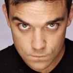 Robbie Williams: “La mia gatta è andata al mio rivale Liam Gallagher”