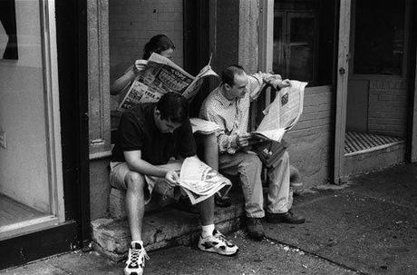 People-reading-newspapers