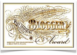 ...e ricevo very inspiring blogger award
