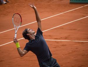 Roger Federer playing tennis at Roland Garros