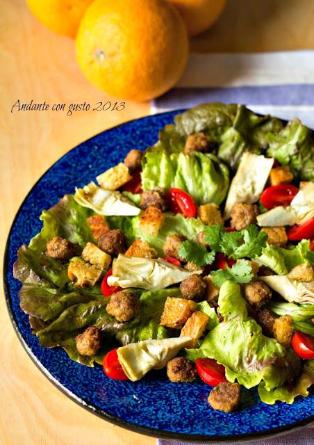 Insalata Canasta con polpettine speziate, datterini e carciofi di Perinaldo.