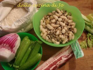 Risotto con legumi, zucchinette e pancetta Risotto con legumi, zucchinette e pancetta