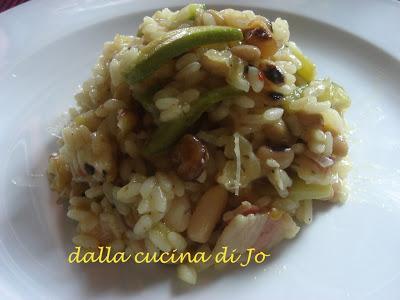 Risotto con legumi, zucchinette e pancetta Risotto con legumi, zucchinette e pancetta