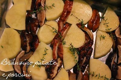 Branzino al forno con patate e funghi porcini