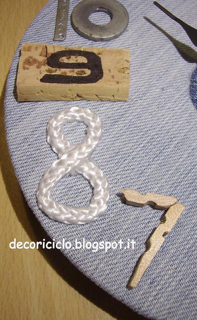 Orologio da parete: fatto con un disco rotto, jeans e vari materiali di recupero orologio disco rotto 4