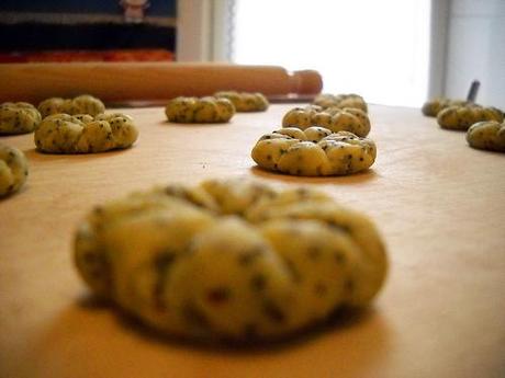 making biscuits with poppy-seeds and cranberries