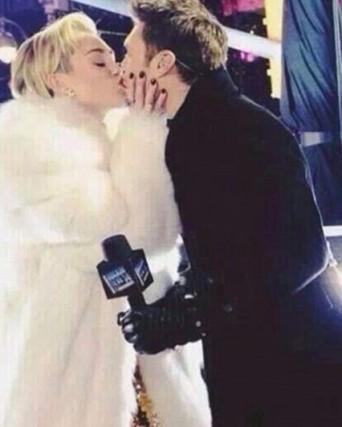 miley-cyrus-kissing-ryan-seacrest-on-new-years-lead