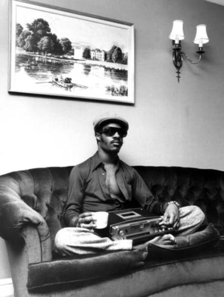 Stevie Wonder relaxing with a cup of tea and his tape player