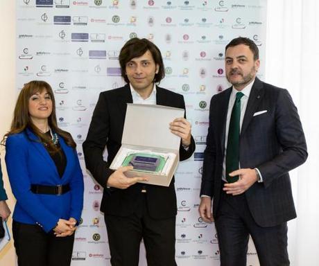 Elisa Barretta presidente di ASSO.EURO.WE.P.P. insieme a Presidente di Federmoda Massimiliano DE Toma premiano Anton Giulio Grande