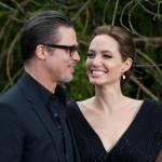 Angelina Jolie in abito nero sul red carpet di Maleficent: con lei c’è Brad FOTO
