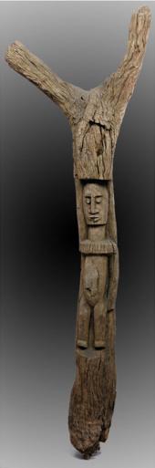 pilastro per Togunà con scultura di una figura maschile. Il Togunà è il luogo decisionale di governo del villaggio Dogon.