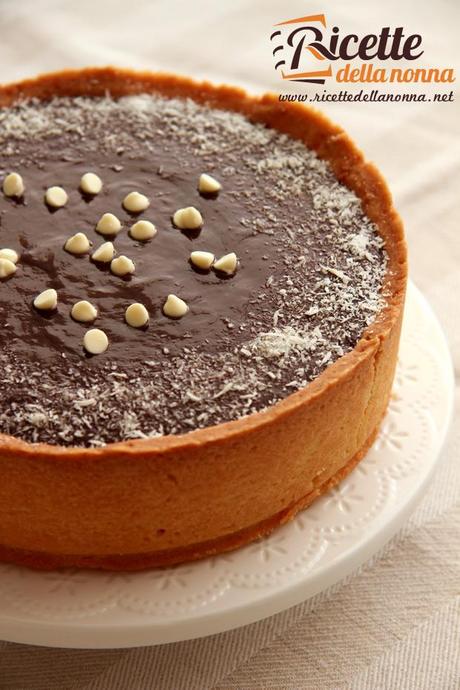 Crostata al cocco e mandorla con ganache al cioccolato ricetta torta cocco ganache cioccolato