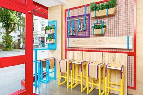 A Bright & Colorful Restaurant with Branding to Match in main interior design art  Category