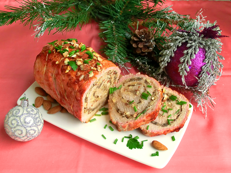 Rotolo di lonza maiale farcito con funghi e mandorle Rotolo di lonza di maiale farcito con funghi e mandorle