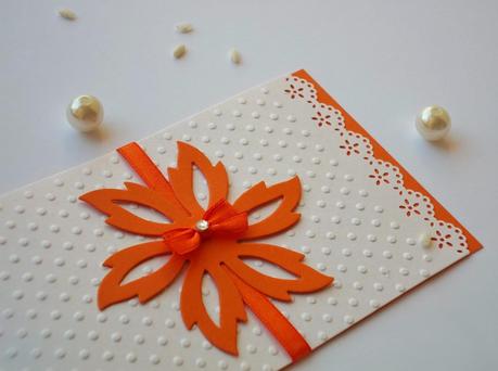 Creazioni per cerimonio tonalità arancio e bianco perla