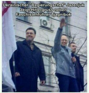 La scritta dice: il capo del governo Ucraino fa il saluto hitleriano accanto al leader fascista Tjagnibok