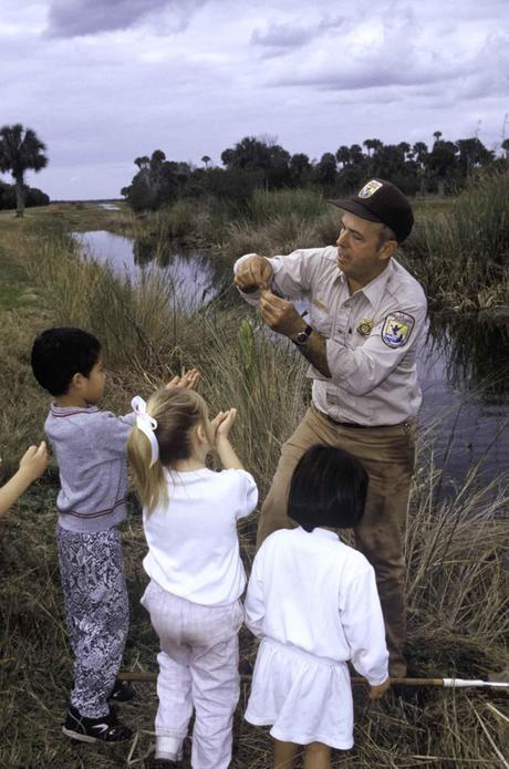 Man_with_children_in_nature