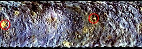 Una mappa a falsi colori  della superficie di Cerere catturara dalla sonda Dawn e realizzata per mettere in risalto le differenze di colore della superficie. Nei due cerchi, le due macchie luminose Spot 1 (a sinistra) e Spot 5 (a destra). Crediti: NASA/JPL-Caltech/UCLA/MPS/DLR/IDA