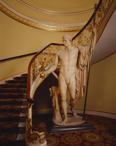 View of the statue of Napoleon holding a figure of Victory by Antonio Canova, in the stairwell at Apsley House