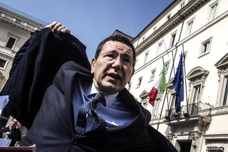 Il Sindaco di Roma Ignazio Marino, lascia Palazzo Chigi dopo l'incontro tra il Presidente del Consiglio Matteo Renzi con la delegazione di Sindaci dell'Anci. Roma 20 marzo 2014.