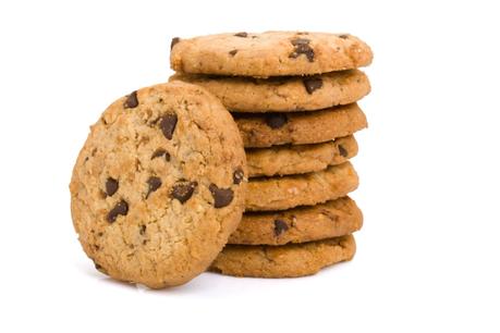 Pile of chocolate chip cookies isolated on white background