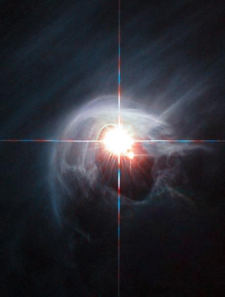 Doppia binaria nella nube scura Crediti: ESA / Hubble e NASA, Ringraziamenti: Judy Schmidt