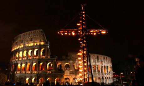 Cardinal Camillo Ruini presides the Holy Friday's Via Crucis at Rome's Colosseum, replacing Pope John Paul II who briefly apperead on a video screen. The 84 years old Pontiff followed The Station of the Cross ceremony in his private chapel on TV.