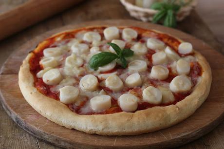 Pizza con cuore di palma e formaggio di manioca Pizza de palmito e queijo de mandioca Pizza con cuore di palma e formaggio di manioca Pizza de palmito e queijo de mandioca