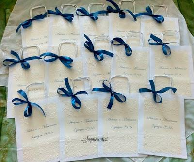 Wedding Bag, portafazzolettini e ventagli avorio e blu notte Wedding Bag, portafazzolettini e ventagli avorio e blu notte