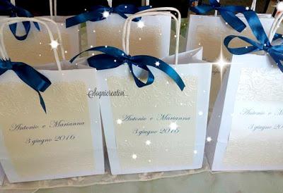 Wedding Bag, portafazzolettini e ventagli avorio e blu notte Wedding Bag, portafazzolettini e ventagli avorio e blu notte