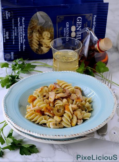 Eliche con Rana Pescatrice, Calamaretti, Ciliegini Gialli e Olive di Cerignola Eliche con Rana Pescatrice, Calamaretti, Ciliegini Gialli e Olive di Cerignola