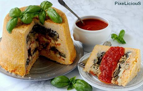 Sartù di Riso al Pomodoro con Melanzane, Provola e Polpettine di Salsiccia Sartù di Riso al Pomodoro con Melanzane, Provola e Polpettine di Salsiccia
