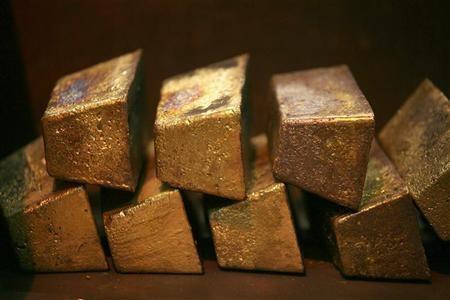 50440-gold-bars-are-displayed-at-south-africas-rand-refinery-in-ge