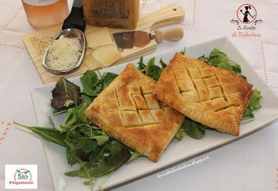 Quadri di sfoglia ripieni di zucca Mantovana, salvia e Asiago DOP su letto di misticanza con vinaigrette all'arancia, vino d'accompagnamento Dilé Rosato Quadri di sfoglia ripieni di zucca Mantovana, salvia e Asiago DOP su letto di misticanza con vinaigrette all'arancia, vino d'accompagnamento Dilé Rosato