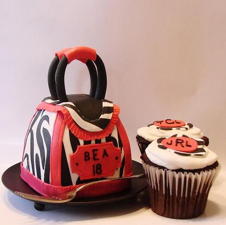 purse cakelet and coordinating cupcakes