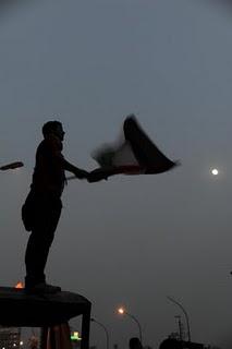 The man, the moon, the Palestinian flag