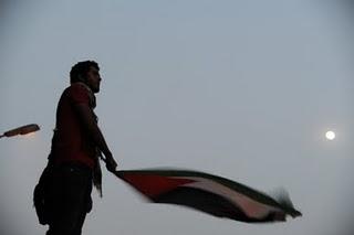 The man, the moon, the Palestinian flag