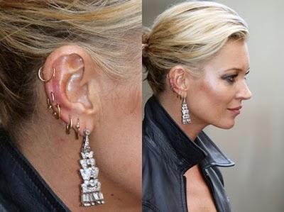 Kate Moss sporting the multiple earrings!