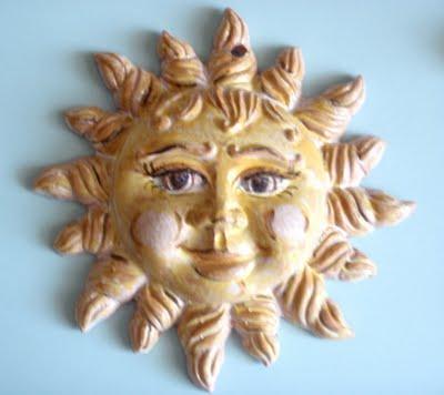 una ceramica al giorno....anzi due: il sole e la  luna